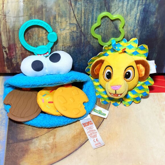 (2) BABY TOYS SENSORY PLUSH TOY CLIPS LAMAZE LION KING & COOKIE MONSTER CLIP - Picture 1 of 4